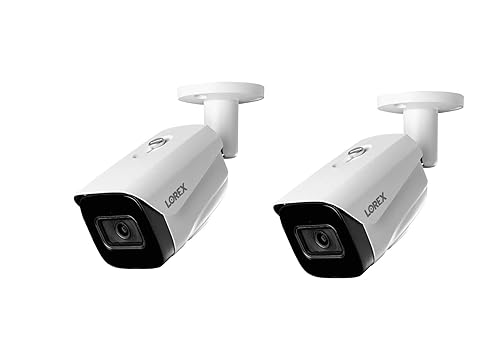 Two Lorex 4K Nocturnal IP Cameras, white outdoor security cameras renowned for their best-in-class night vision AI and facial recognition capabilities for 2025.
