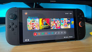 Nintendo Switch 2 console displaying a selection of games on the screen, placed on a wooden surface.

